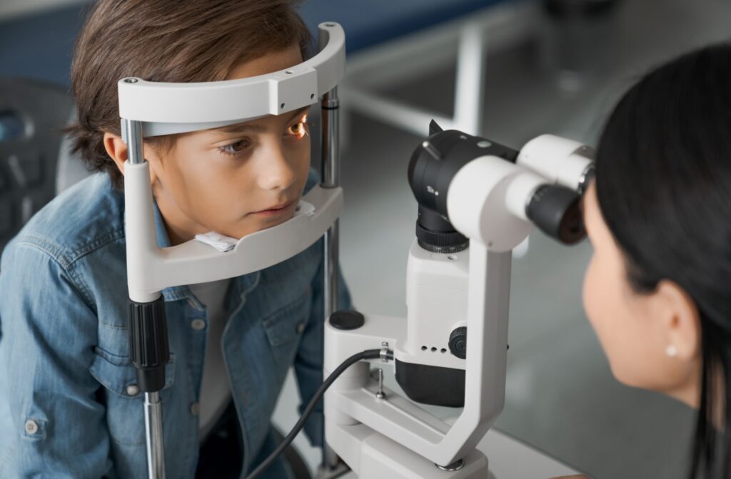 Child undergoing an eye examination with a slit lamp