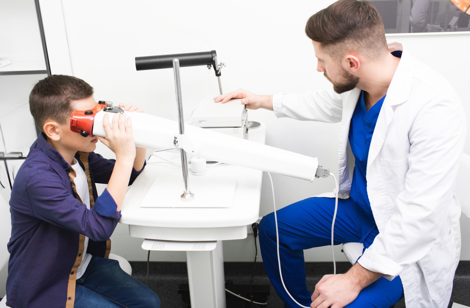 A child performs eye therapy exercises as a treatment for amblyopia.